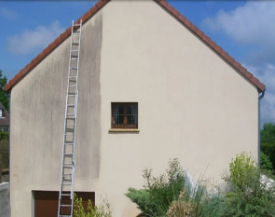 Photo d'un nettoyage de mur d'une maison